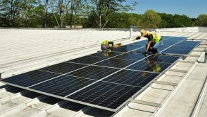 Team Sundance installing solar panels at Hanvey Engineering, Easley, South Carolina